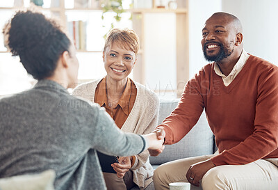 Buy stock photo Black couple, financial advisor and handshake on home sofa for discussion with broker and shaking hands for agreement, contract and deal. Happy man and woman talking to agent for insurance or loan