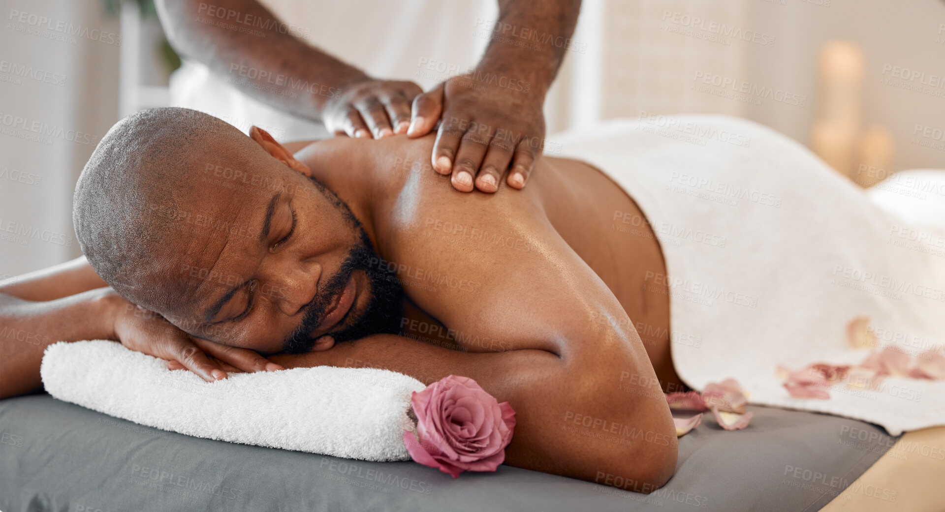 Buy stock photo Black man, spa and luxury back massage at a physical therapy session or beauty salon. Wellness, relax and peace feeling of a person calm, relaxing, resting at massage therapist with hospitality care