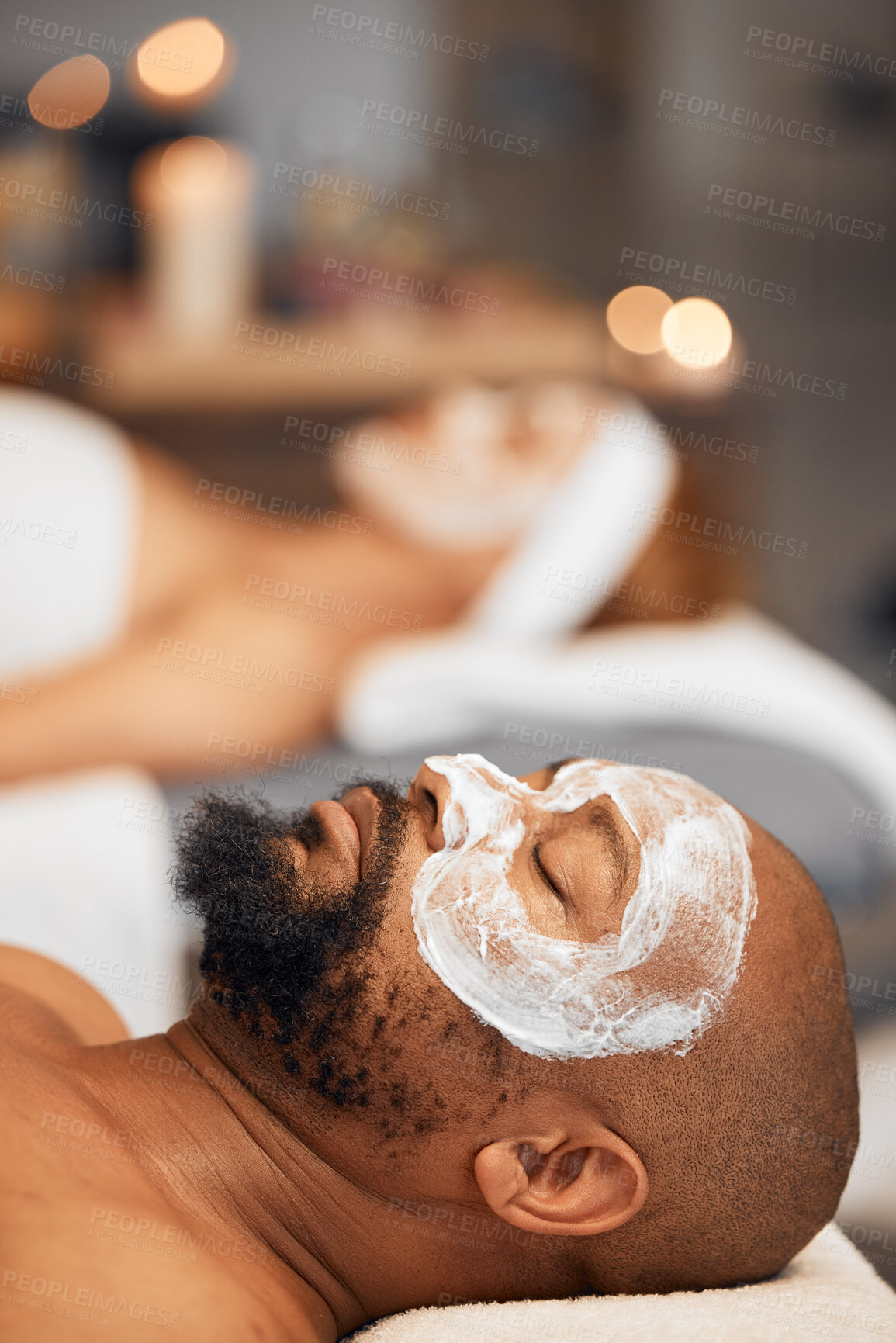 Buy stock photo Spa facial, skincare and couple with face mask for luxury self care routine, glowing skin or wellness treatment. Beauty product, healthcare support and black woman and man relax with salon face cream