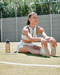 Woman, tennis player and stretching legs on tennis court for fitness, muscle flexibility and injury prevention in a match competition. Tennis support training, performance exercise and cardio workout