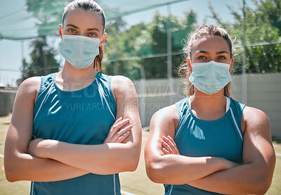 Buy stock photo Badminton, face mask and women with arms crossed for sports, training and commitment as a team on court. Teamwork, collaboration and portrait of friends with safety from covid during sport exercise