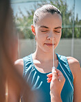Sports woman, covid or pcr test on court for fitness compliance, workout or training law for international competition. Athlete, covid 19 or cotton swab nose testing for badminton exercise compliance