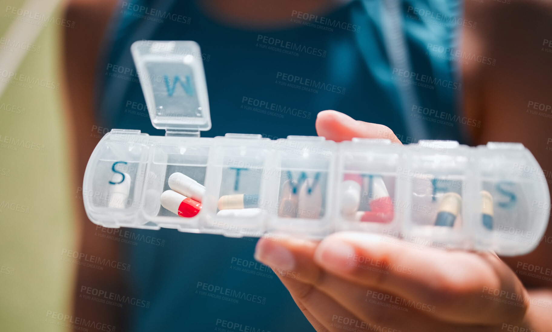 Buy stock photo Hands, medicine and pills container schedule for health, wellness and medication reminder for vitality macro. Self care, management and pharmaceutical plastic case for healthy drugs lifestyle woman.