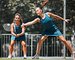 Sports women, fitness or badminton for teamwork, sport wellness or training game on tennis court in an event. Partnership, friends or woman players for exercise, workout or team building game