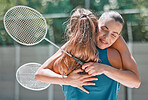 Badminton, success and friends hug after a sports match or training game for support, love and congratulations. Fitness, smile and happy women hugging in celebration of teamwork in a girl competition