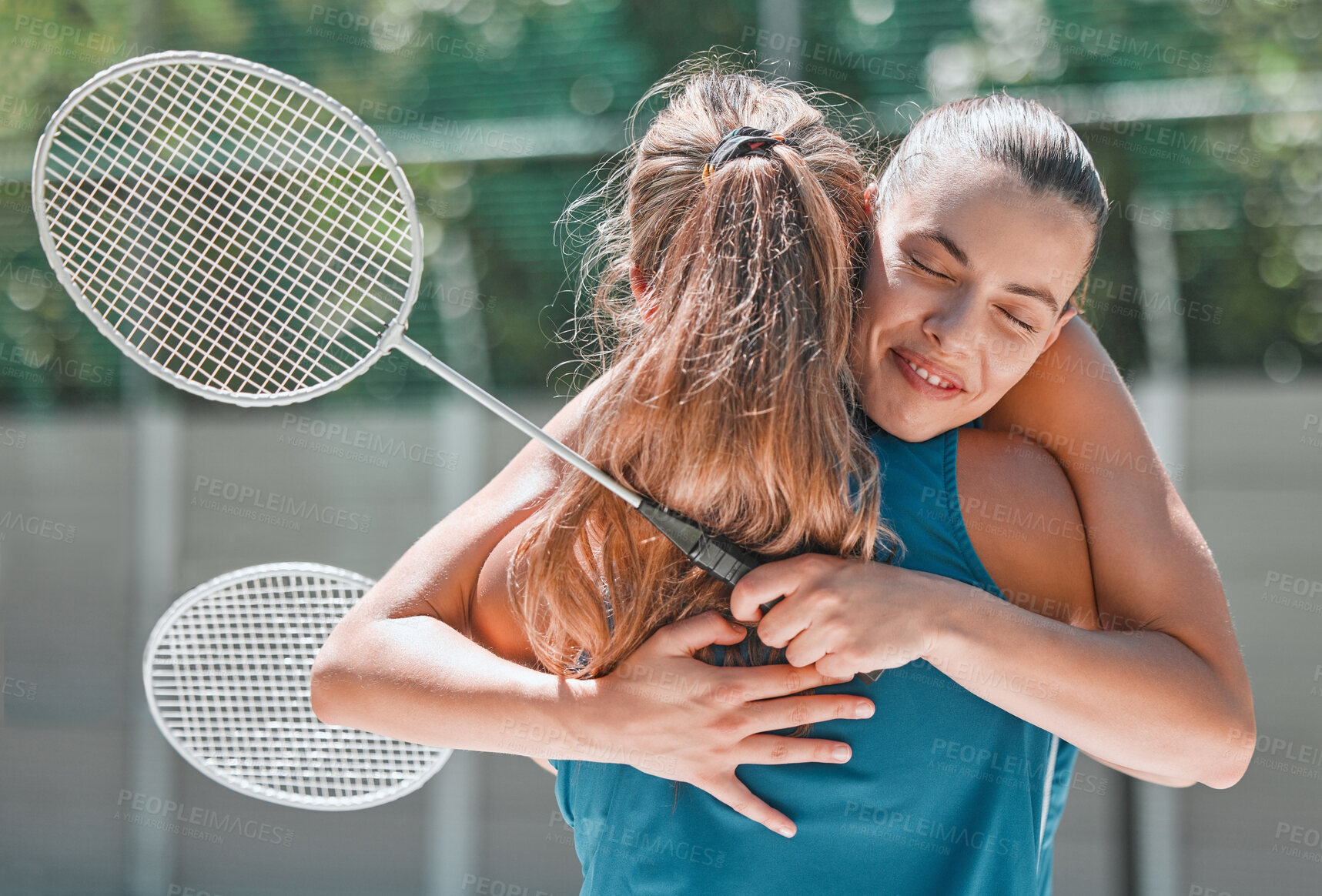 Buy stock photo Badminton, success and friends hug after a sports match or training game for support, love and congratulations. Fitness, smile and happy women hugging in celebration of teamwork in a girl competition