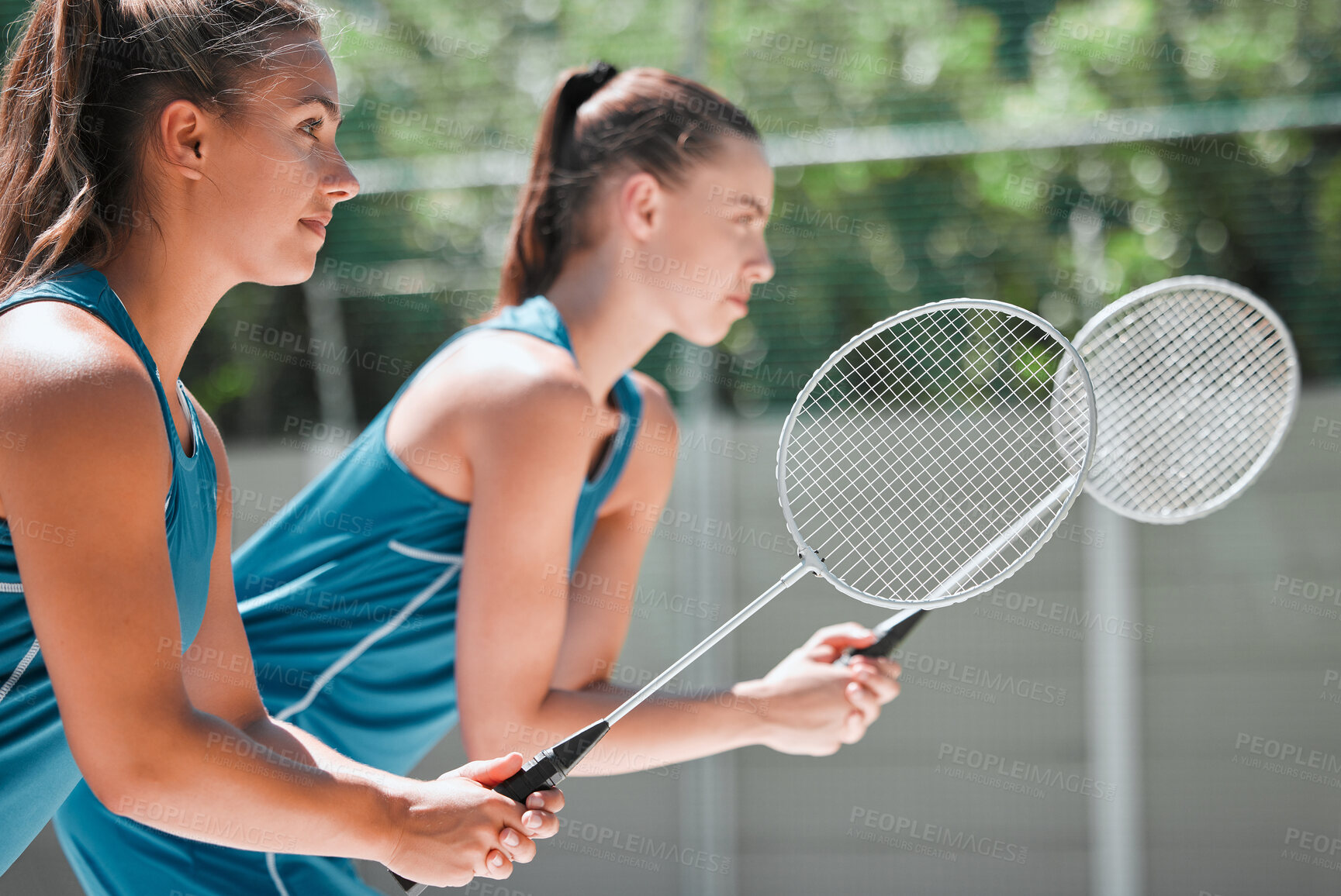 Buy stock photo Teamwork, sports and badminton with women on court for training, workout and exercise together. Games, match and competition with girl athlete ready for cardio, health and fitness endurance in summer