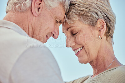 Buy stock photo Senior, couple with forehead touch and smile for love with care, bonding and retirement outdoor. Elderly man, woman and happy for romance closeup with embrace, happiness and face to face in summer