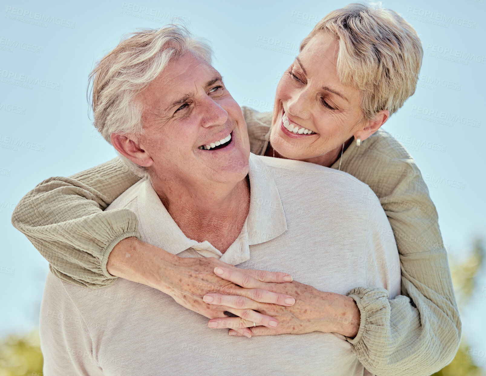 Buy stock photo Senior, couple and hug with happiness of elderly people loving retirement and love outdoor. Happy, marriage and smile of a wife and man together feeling care, commitment and happiness for anniversary