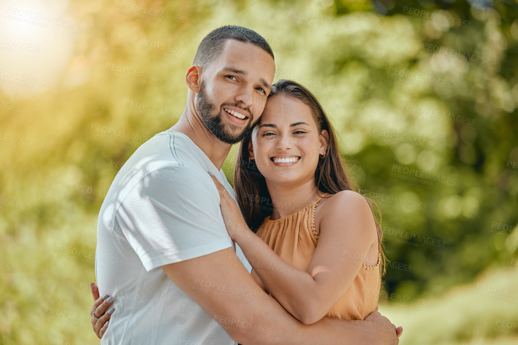 Buy stock photo Happy couple hug, love and care in park, garden and nature for easy lifestyle, romantic date and free time together outdoors. Portrait of smile man, relax woman and young people in summer backyard 