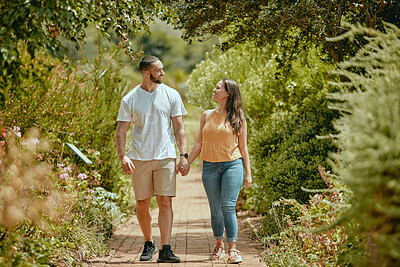Buy stock photo Couple, hand holding and nature park walking of people on a outdoor path with a smile. Happy girlfriend and boyfriend together showing love, care and commitment on a walk or hike feeling happiness