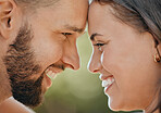 Face of happy couple touching head in love, care and happiness in garden, park or spring nature outdoors. Closeup young, smile and happy people, man and woman relax together on romantic summer date