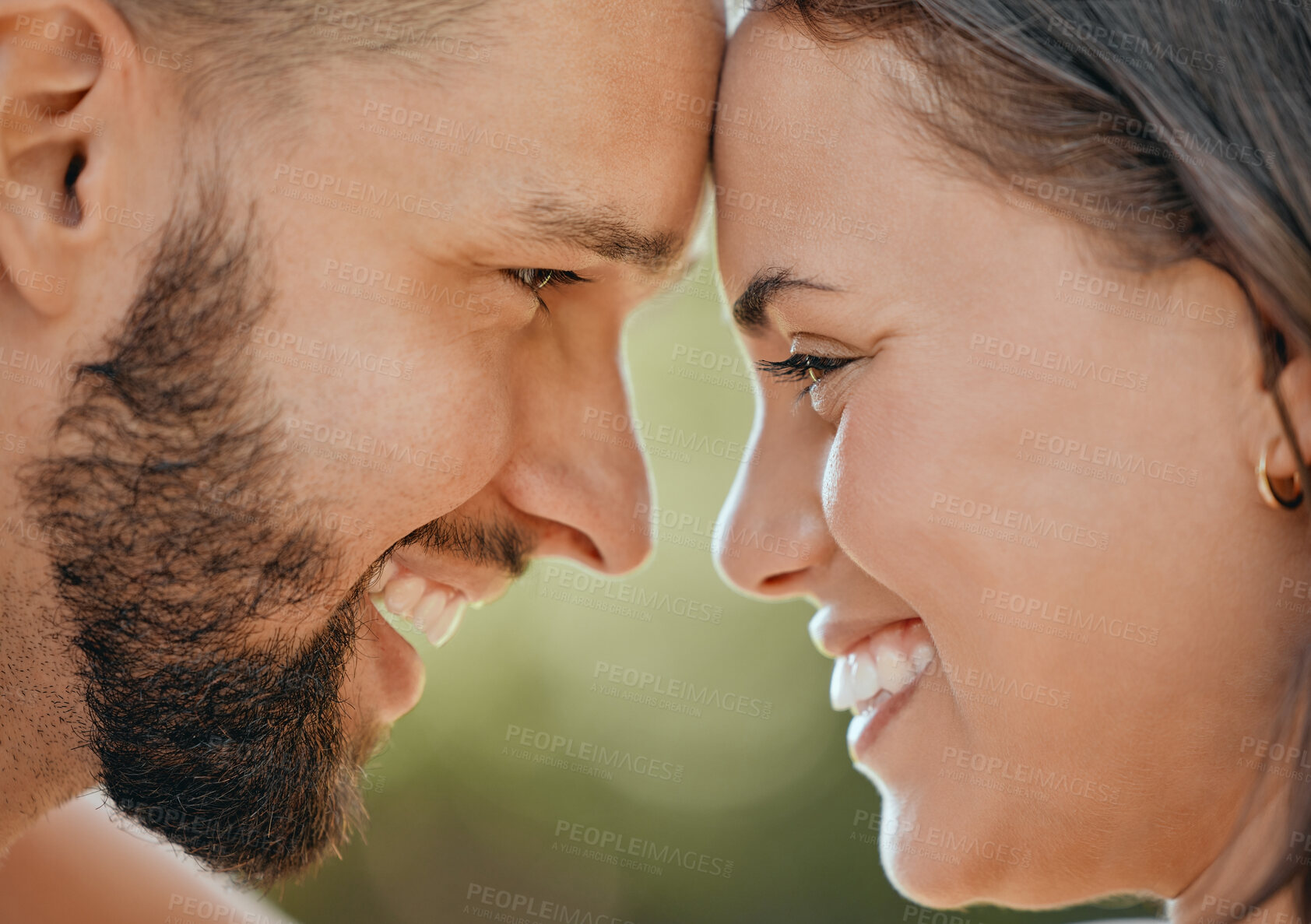 Buy stock photo Face of happy couple touching head in love, care and happiness in garden, park or spring nature outdoors. Closeup young, smile and happy people, man and woman relax together on romantic summer date