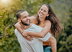 Love, fun and nature couple hug while playing, happy and enjoy outdoor quality time together in Toronto Canada park. Freedom peace, partnership trust and man piggyback woman on romantic bonding date