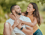 Couple, love hug and relax at park, nature or outdoors on vacation or holiday trip. Support, romance and man bonding with woman outside, enjoying quality time together and having fun on date.



