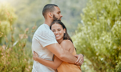 Buy stock photo Love, hug and couple on a date in nature, happy and at peace together during summer. Relax, smile and young man and woman hugging with affection and bonding  in a park or garden on a holiday