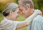 Elderly, couple and forehead touch in closeup with love, care and bonding in retirement outdoor. Senior man, woman and retired romance in park, garden or backyard for hug, happy or face together