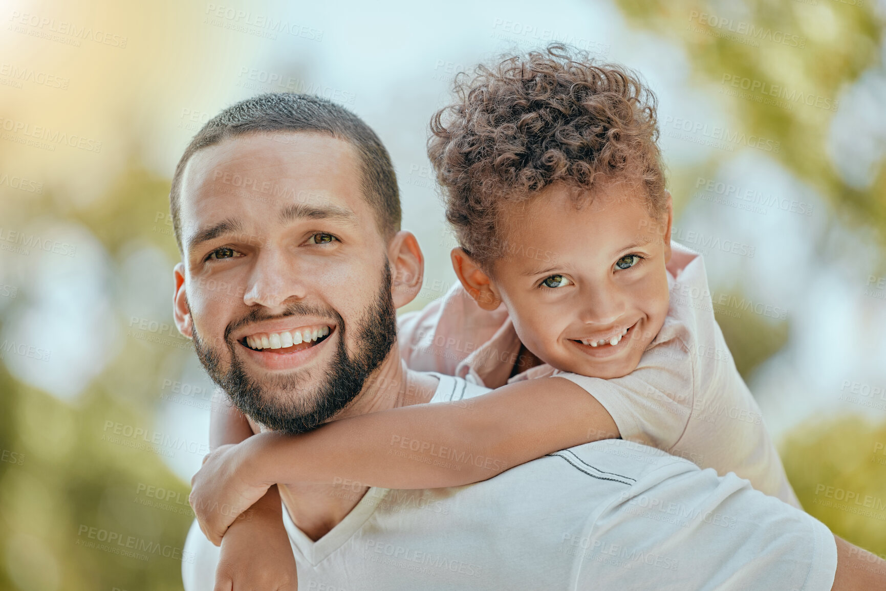 Buy stock photo Dad, family and piggy back portrait with happy son in park to relax, bond and smile together. Father, happiness and wellness of parent with young child enjoying outdoor summer fun in nature.


