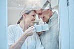 Senior couple, happy and love with coffee on a weekend morning at home. Weekend, laugh and smile, elderly woman and man relax with drink in home. Romance, happiness and drinking sweet tea together