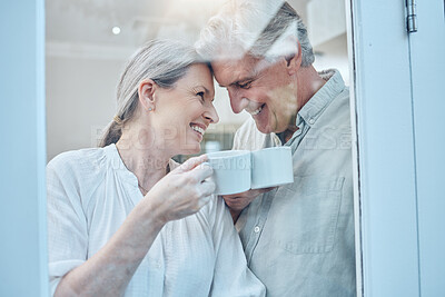 Buy stock photo Senior couple, happy and love with coffee on a weekend morning at home. Weekend, laugh and smile, elderly woman and man relax with drink in home. Romance, happiness and drinking sweet tea together