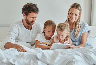 Buy stock photo Tablet, movie and family in bedroom streaming a lovely series on subscription online and relaxing on a lazy morning. Mother, father and children watching tv for bonding and entertainment on a weekend