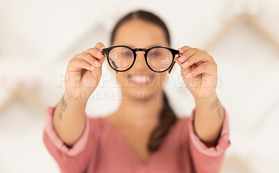 Buy stock photo Vision, eyesight and woman with glasses in hands for eye test, holding spectacles in blurred background. Healthcare, medical insurance and eyes, girl in blur with prescription lens in spectacle frame