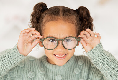 Buy stock photo Glasses, frame and portrait of child with vision, eye care and eyes healthcare, wellness and insurance trust, choice and shopping. Happy kid with lens check, test or assessment at an optometry store