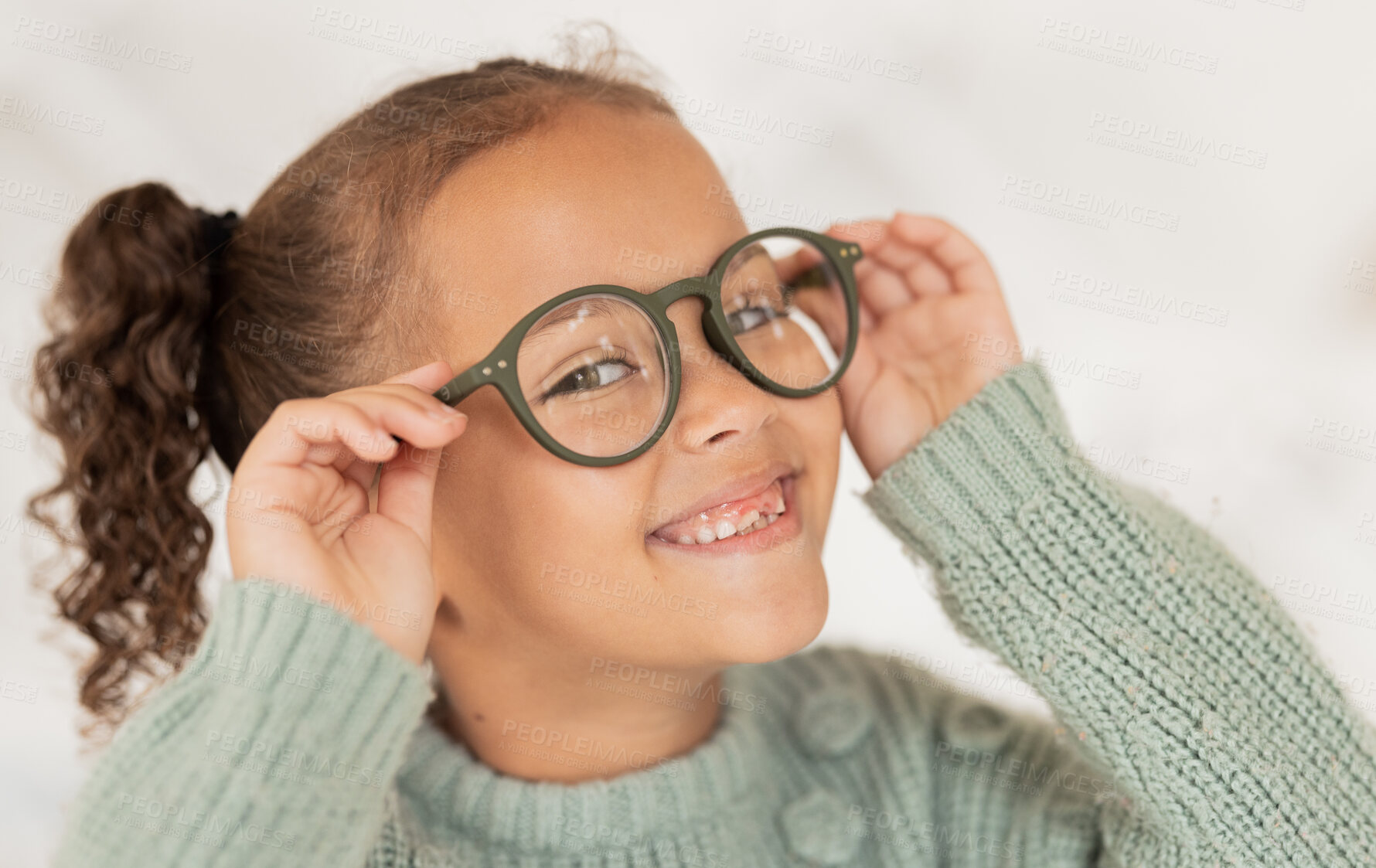 Buy stock photo Face portrait, child and girl with glasses for optical health at optometrist office. Eyes wellness, eye care and happy kid with specs, spectacles or prescription lenses to help with ocular vision.