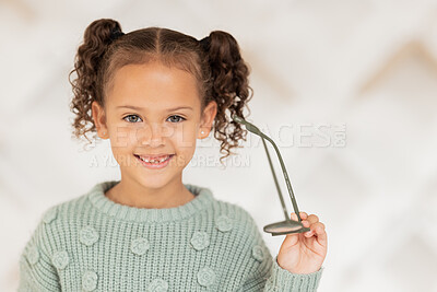 Buy stock photo Glasses, portrait and child happy with her vision health, eye care and medical insurance for kids optometry discount, sale or promotion. Kid smile for frame choice and eyes service in a store mock up