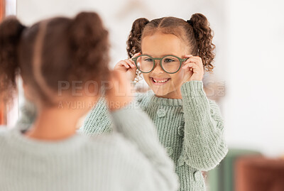 Buy stock photo Children, mirror and girl with glasses at optometry store, testing or shopping for new eyewear. Vision, choice and happy kid trying spectacles or lenses at optics shop while looking at reflection.
