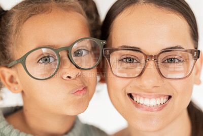 Buy stock photo Family, optometry and eye care with glasses for mother and child together for vision, focus and eyesight with lens frame mockup. Portrait and face of woman and girl together for ocular health
