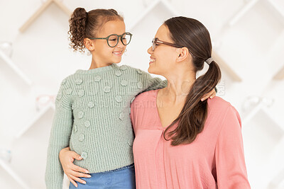 Buy stock photo Mother, girl child and glasses in shop, happy with clear vision and eyesight with prescription specs. Healthcare, medical insurance and mom with smile and kid shopping for new spectacles or frames.