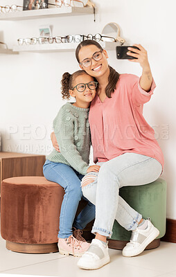Buy stock photo Glasses, retail and selfie with mother and child in vision and optometry store for eyewear. Shopping, photo and parent taking picture in eyewear shop for eye care, eye health ophthalmology 