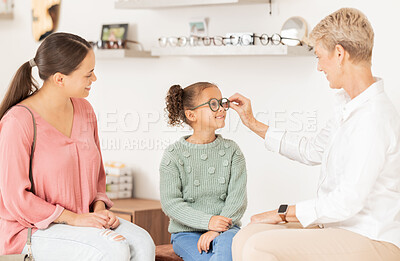Buy stock photo Vision glasses, mother and child with optometrist for eye care consultation, prescription eyeglasses or eyesight test. Optometry lens store, ophthalmology healthcare support and patient at eye exam