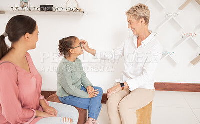 Buy stock photo Mother, child and happy optometrist with glasses at after examine, eye test or consulting for healthy eyes. Optician, visual healthcare and medical prescription spectacle for girl kid with mama