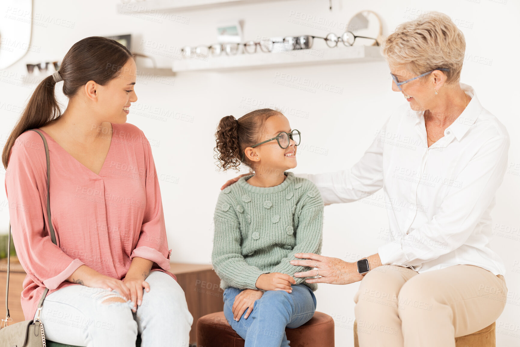 Buy stock photo Optometry, glasses and vision with a girl, mother and optician meeting for an appointment or checkup in an optometrist office. Family, kids and eyewear with a woman and daughter at an ophthalmologist