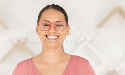 Buy stock photo Face, glasses and vision with a woman at an optometrist for an eye test or buying prescription lenses. Portrait, retail and eyewear with a female customer shopping for frame spectacles at an optician