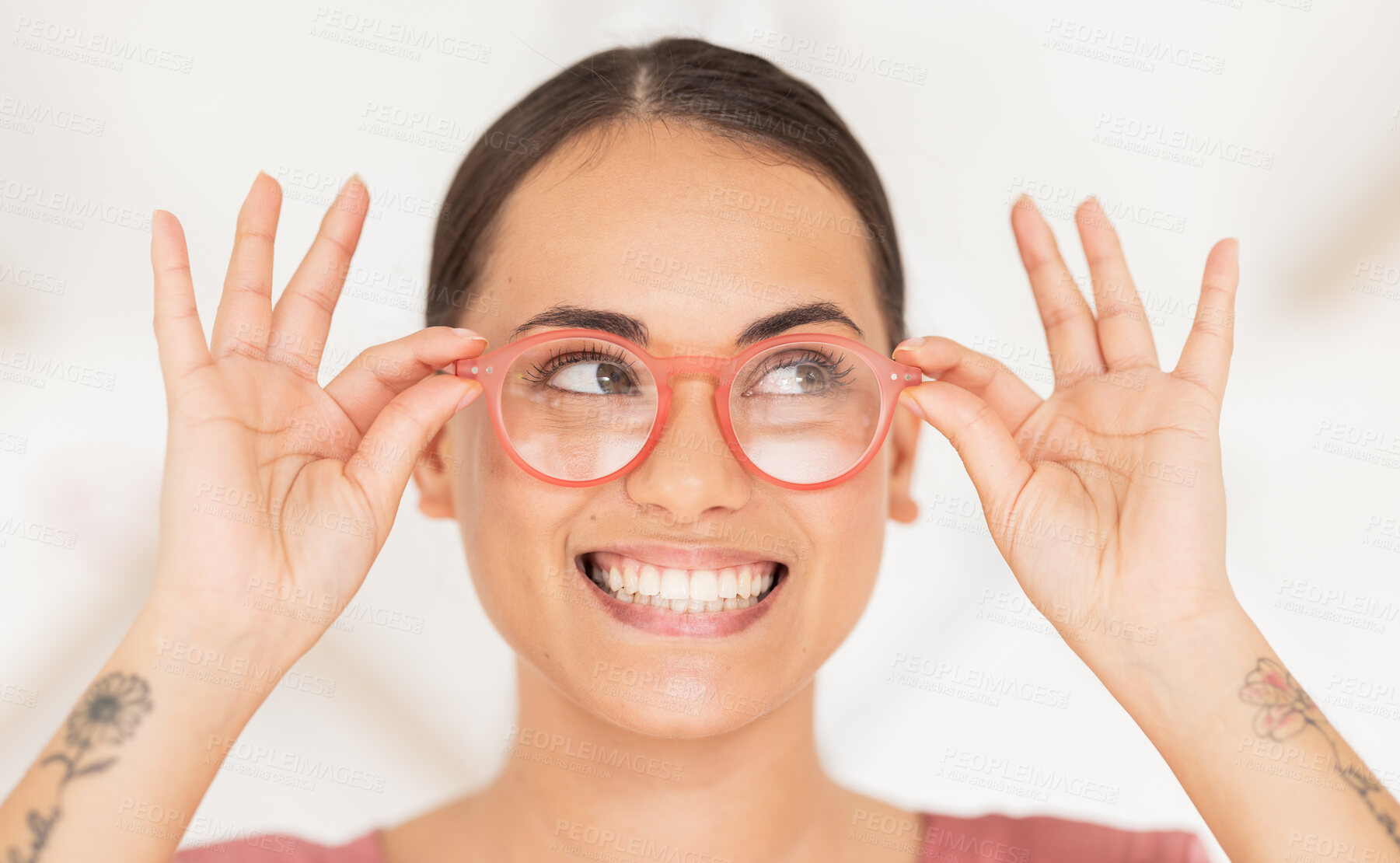 Buy stock photo Vision, eyesight and woman putting on glasses with smile holding spectacles on face. Healthcare, medical insurance and eyes, happy girl with trendy prescription lens in spectacle frame at eye exam.