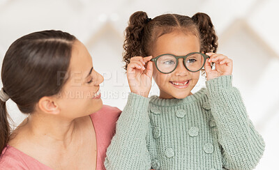 Buy stock photo Optometry, vision and mother with child with glasses after examination, test and diagnosis for eyesight. Family, healthcare and happy girl with new spectacles in doctor office after optical exam