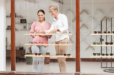 Buy stock photo Vision, woman and retail shopping for glasses on a promotional sale, discount offers or store deals at the optometrist. Smile, eyes and optician helping a happy customer with frames eye care choices