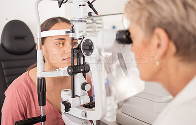 Buy stock photo Eye exam, ophthalmologist and vision of woman, eyes or eye test with slit lamp or machine. Healthcare, eyesight and medical examination by doctor or optometrist at hospital or clinic for wellness.
