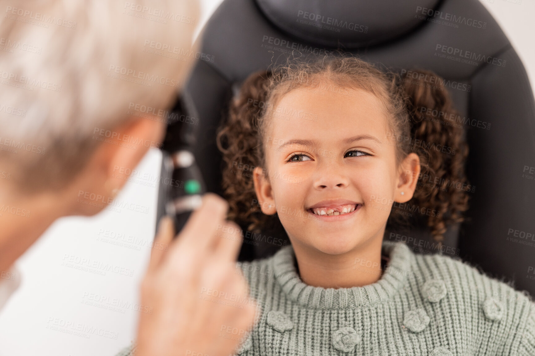 Buy stock photo Happy, test and child with eye doctor for eyesight, vision or retina testing at an optometrist appointment. Smile, consulting and young girl with optician for an eye exam or expert eye care treatment