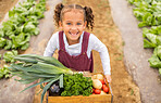 Child, portrait and box of farm vegetables excited for harvest, farming and help with gardening. Youth, young and little girl with happy smile helping in nutrition, health and food garden.
