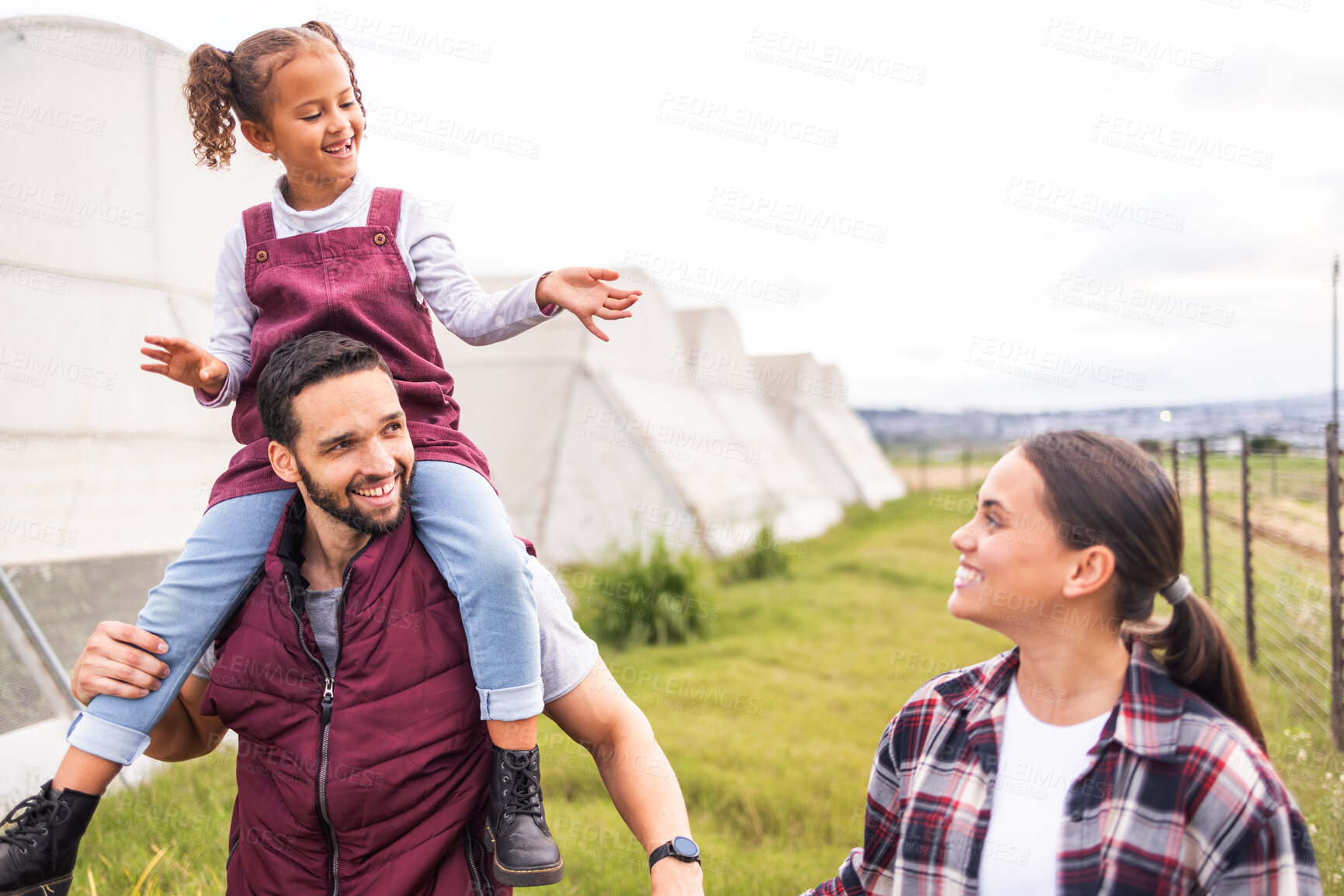 Buy stock photo Farm, family and children with a girl, mother and father working together on agricultural farmland. Kids, agriculture and sustainability with farmer parents and daughter in the organic harvest season