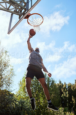 Buy stock photo Basketball, black man and shooting, athlete and fitness, playing sports on outdoor basketball court and jumping. Active, exercise and sport with muscle, strong and training with workout in nature.