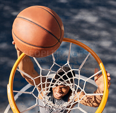 Buy stock photo Basketball sports, black man and top view of dunk at basketball court, training game or match. Fitness, energy jump and basketball player scoring point or practice goal, exercise or workout outdoors.