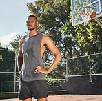 Basketball, black man and fitness on basketball court in the park, break after game with sports and serious in portrait. Strong, cardio and endurance and rest with sweat after sport training outdoor.