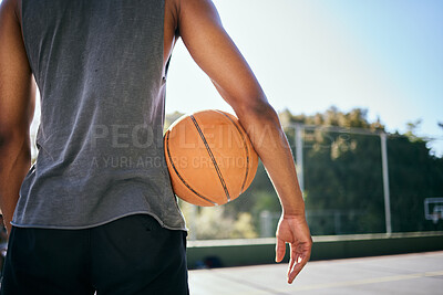 Buy stock photo Basketball, motivation and man holding ball on outdoor court, ready to play game, match and practice. Sports, wellness and black man standing on basketball court for fitness, training and exercise