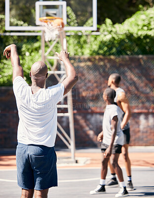 Buy stock photo Basketball player, score and point in sports game for goal, victory or winning throw at the court outdoors. Man in basketball sport playing, scoring and perfect long shot for match outside