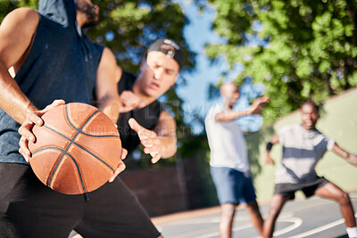 Buy stock photo Fitness, sports and friends on a basketball court playing a game, training match and cardio workout exercise. Teamwork, diversity and healthy men enjoy a challenge with intensity in summer together


